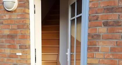 Appartement 'Föhrer Nordseetraum' avec terrasse privée, jardin privé et Wi-Fi