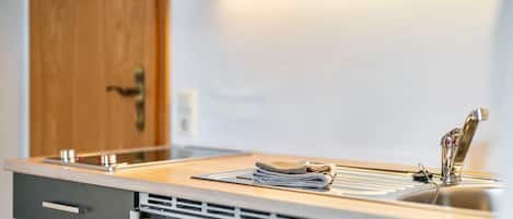 Fridge, microwave, stovetop, coffee/tea maker