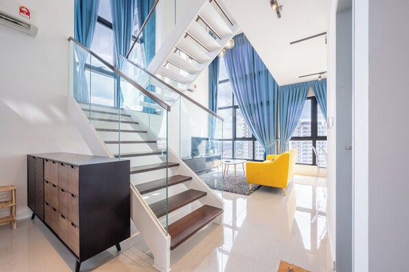 Deluxe Apartment, City View | Living area | 50-inch Smart TV with satellite channels - HighPark Suites by Airhost (Petaling Jaya)