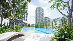 Outdoor pool, open 8:00 AM to 8:00 PM, pool loungers - HighPark Suites by Airhost (Petaling Jaya)
