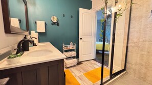 Shower, towels, soap, toilet paper