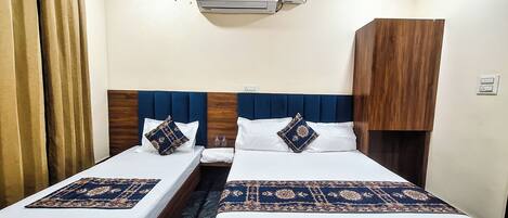 Standard Triple Room, City View | Laptop workspace, free WiFi