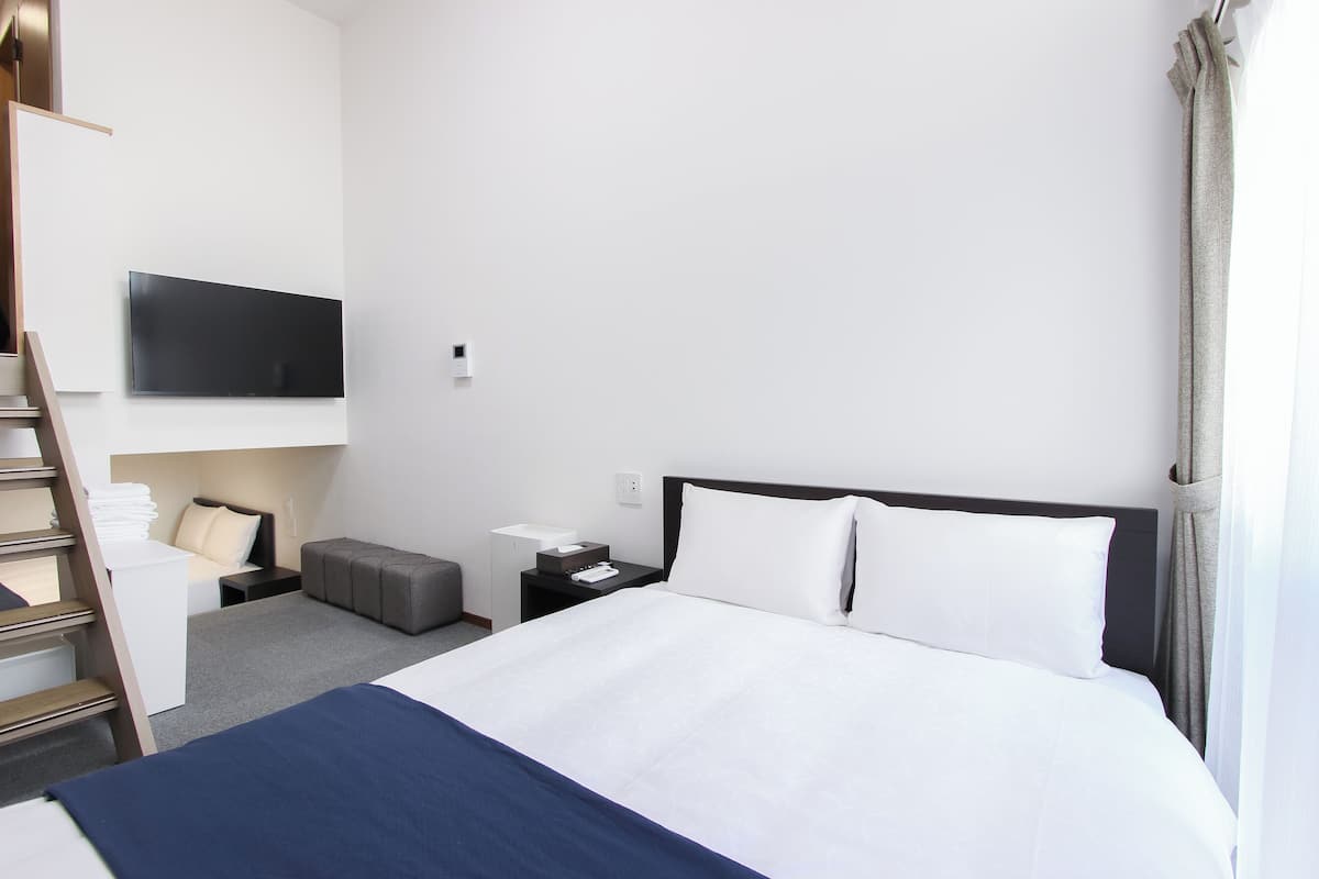 Comfort Quadruple Room, 2 Double Beds | Free WiFi, bed sheets