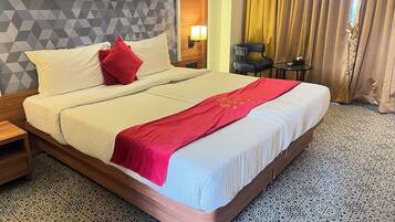 Superior Room | Desk, iron/ironing board, bed sheets