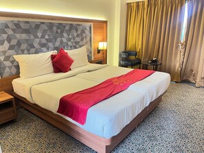 Desk, iron/ironing board, bed sheets - The Saroja Grand Villa Resorts (Vasai)