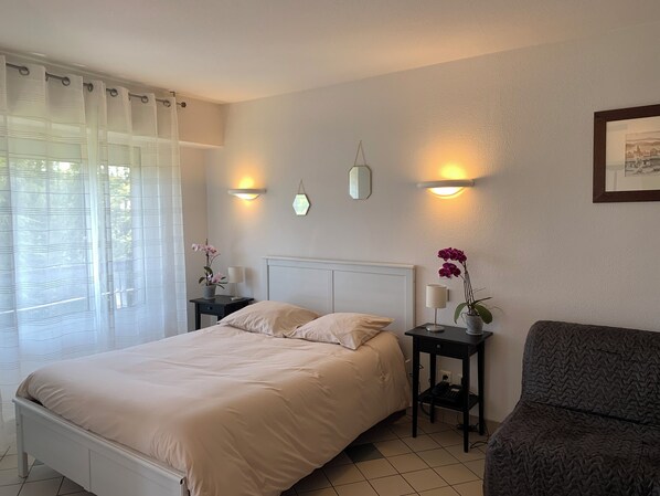 Blackout curtains, iron/ironing board, free WiFi, bed sheets