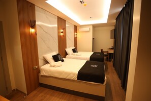 Family Triple Room | Premium bedding, minibar, in-room safe, soundproofing