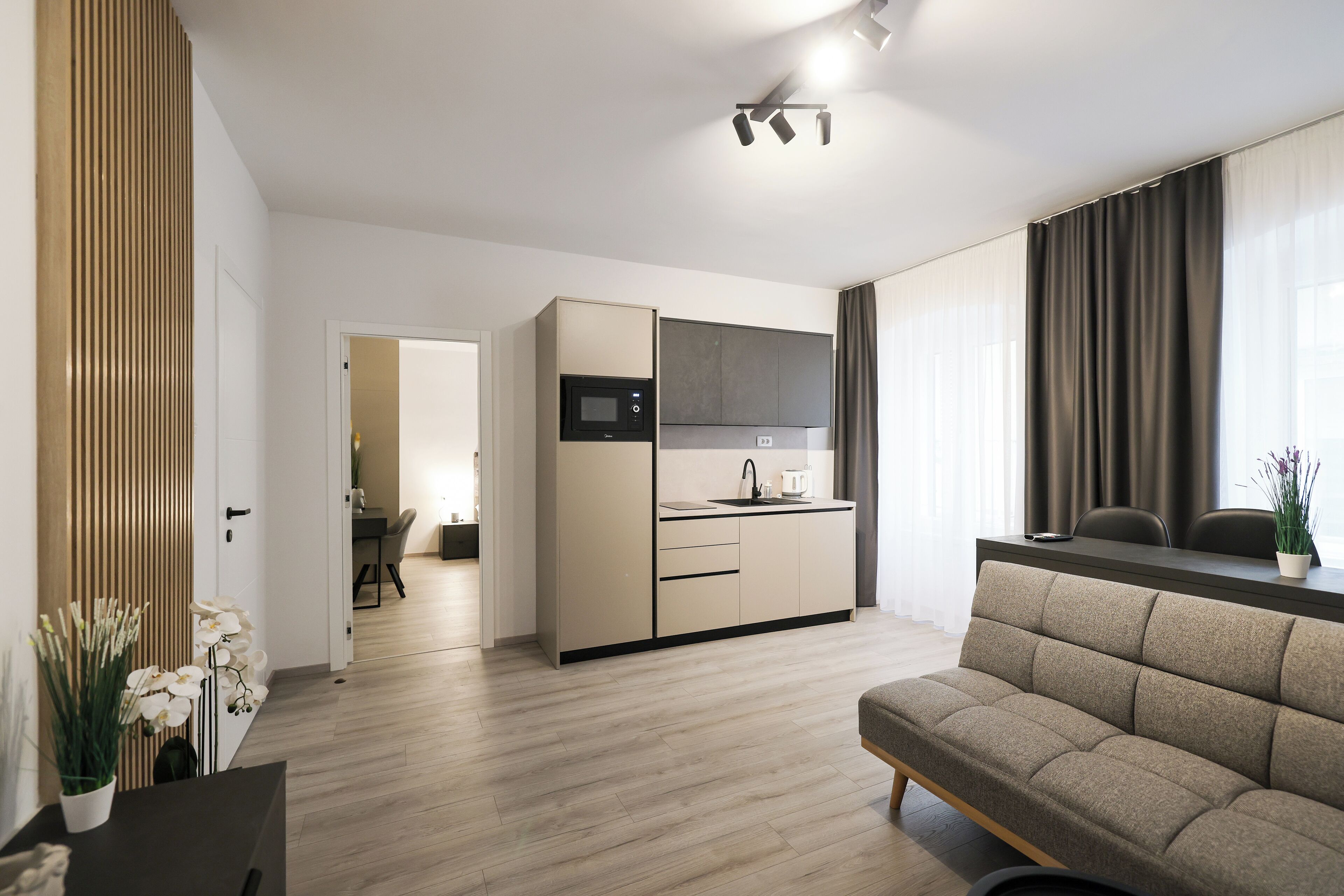Deluxe-Apartment, Stadtblick | Wohnbereich