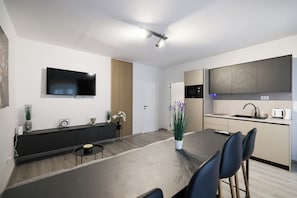 Deluxe-Apartment, Stadtblick | Wohnbereich