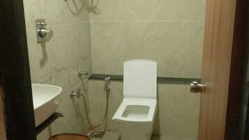 Deluxe Double Room, City View | Bathroom | Free toiletries, slippers, towels, soap