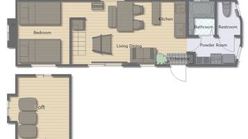 Plano de planta de un hotel que muestra un dormitorio, sala de estar, comedor, cocina, baño y aseo, además de la entrada.
