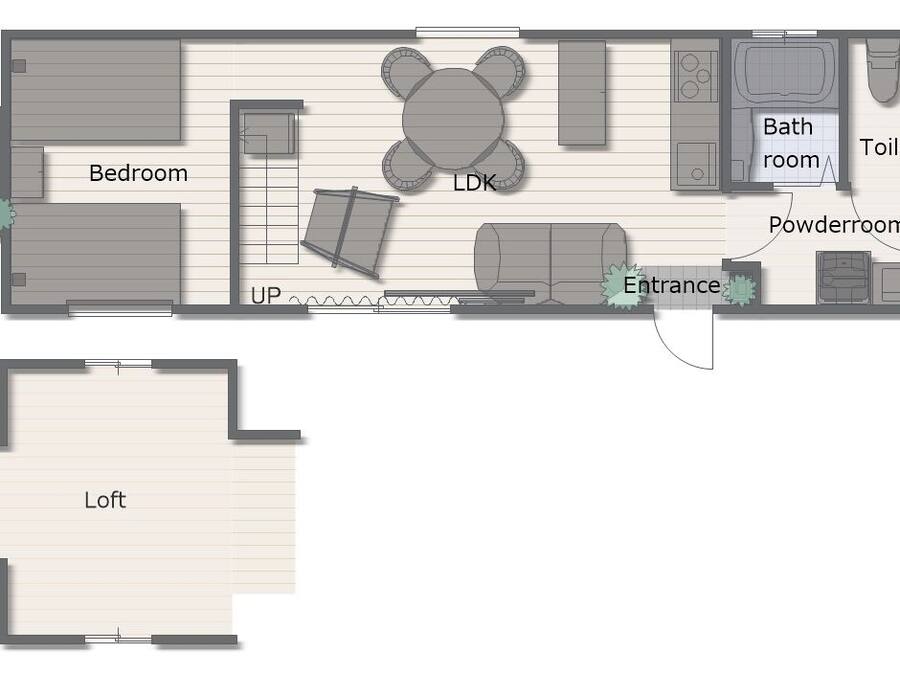 Planta de um quarto de hotel com quarto, sala de estar, banheiro, lavabo e entrada.