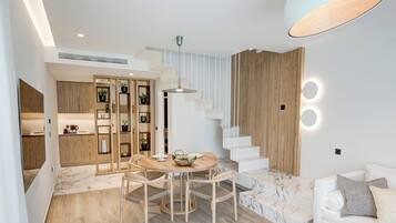 Deluxe Loft, Private Pool | Living area | TV
