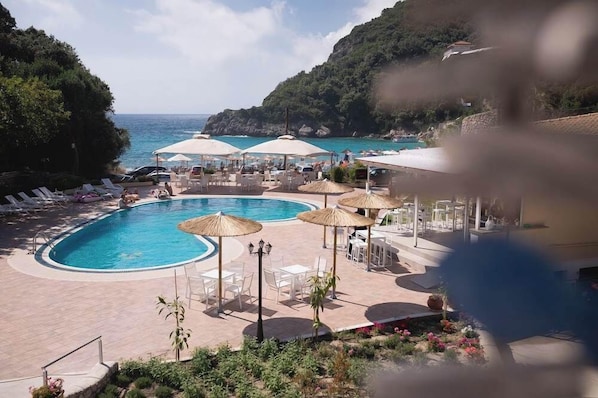 Outdoor pool, pool umbrellas, pool loungers