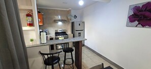 Microonde, forno, piano cottura, macchina per tè/caffè