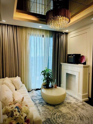 Luxury Apartment, City View | 2 bedrooms, desk, laptop workspace, blackout drapes