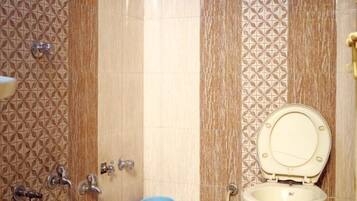 Shower, rainfall showerhead, towels, soap