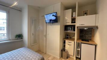 1 chambre, fer et planche Ă repasser, Wi-Fi, draps fournis