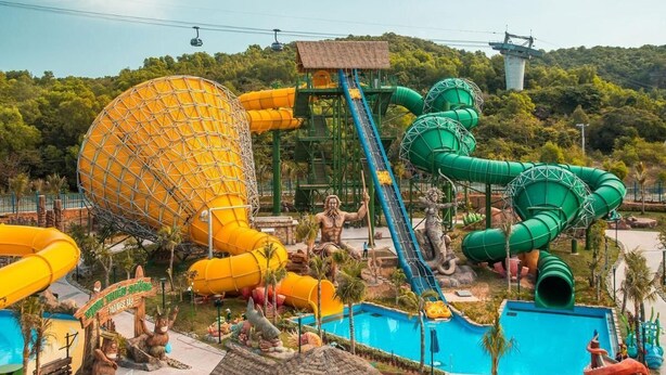 A water park with large slides and pools.