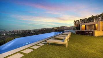 Outdoor pool, sun loungers