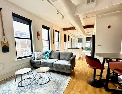 A historic beautifully detailed suite, 1,300 square foot, corner loft in the heart of the Old Market