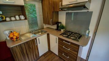 Fridge, microwave, coffee/tea maker, dining tables