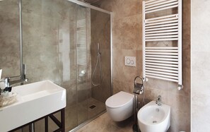 Deluxe Apartment, City View | Bathroom | Shower, free toiletries, hair dryer, bathrobes