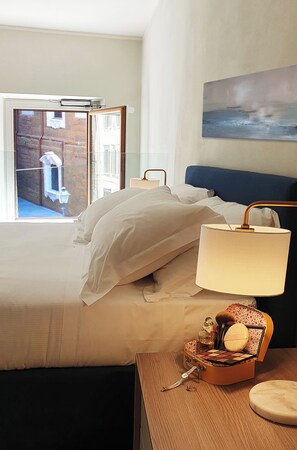 Apartamento Deluxe, vistas a la ciudad | 1 dormitorio, edredones de plumas, espacio para trabajar con un portátil