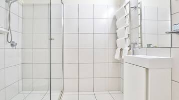 Shower, towels, soap, shampoo
