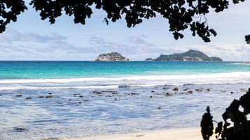 On the beach, white sand, kayaking, rowing
