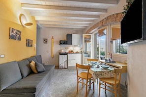 Standard Apartment, Multiple Bedrooms, 2 Bathrooms (Sole Priscilla House - Terrace &) | Living area | 21-inch Smart TV with cable channels