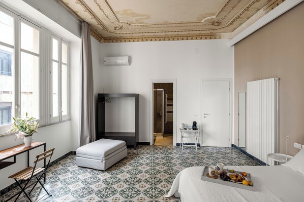 Comfort Quadruple Room, City View | 1 bedroom, individually decorated, laptop workspace, iron/ironing board