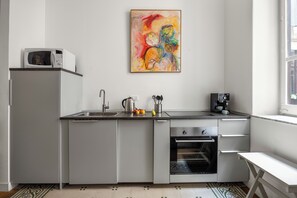 Comfort Apartment, Balcony, City View | Private kitchen | Shared fridge, electric kettle