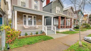 Houses with classic suburban architecture and well-manicured lawns.