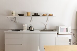 Fridge, microwave, coffee/tea maker, electric kettle