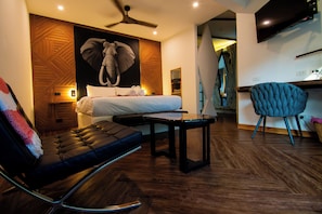 Deluxe Triple Room | Free minibar, in-room safe, individually decorated, desk