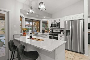Fridge, microwave, oven, stovetop - Backyard Bliss: Firepit, Putt, Play, Pool & Spa! (Scottsdale)