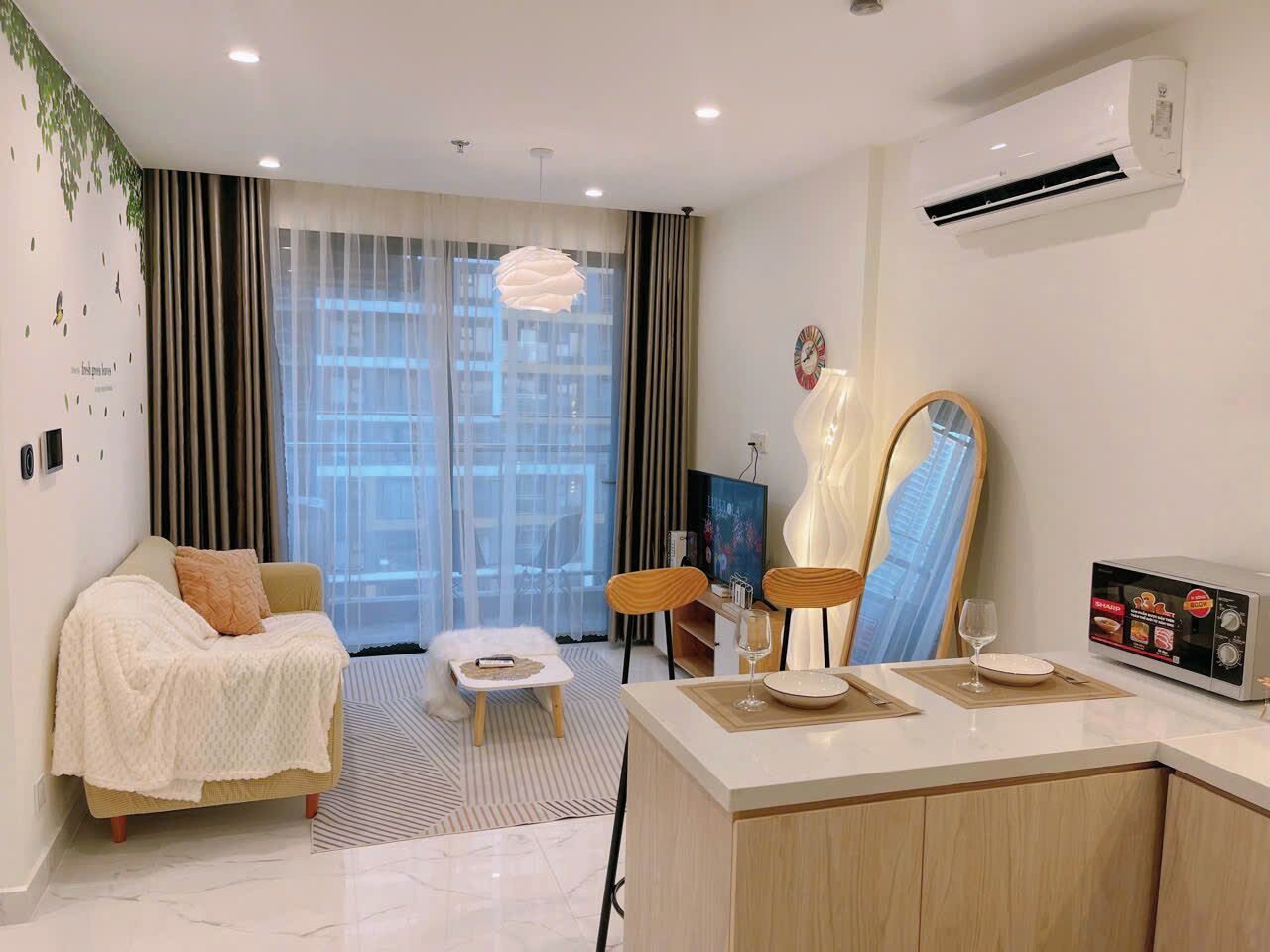 Business Apartment, City View | Living area | Flat-screen TV