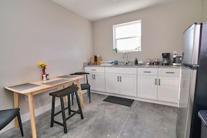 Fridge, microwave, coffee/tea maker, toaster