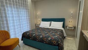 Family Double Room, City View | Minibar, blackout curtains, soundproofing, free WiFi