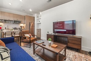 TV - Grand New Studio Apartment with Pool and Golf Sim (Austin)