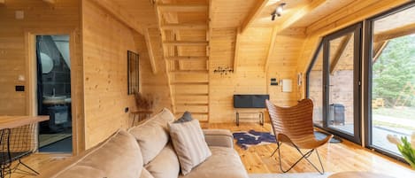 Comfort Chalet, Patio, Mountain View | Living area | 42-inch flat-screen TV with digital channels, TV
