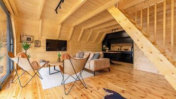 Comfort Chalet, Patio, Mountain View | Living area | 42-inch flat-screen TV with digital channels, TV