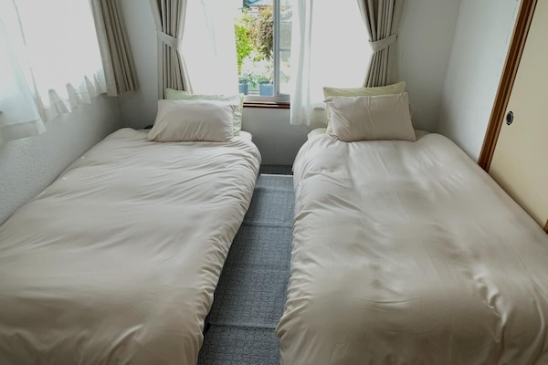 Family Apartment, 2 Bedrooms, Non Smoking | 2 bedrooms, desk, laptop workspace, free WiFi