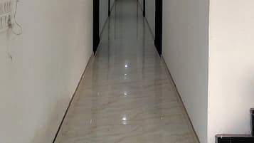 Deluxe Double Room, City View | Living area | TV