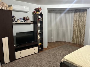 1 habitación, tabla de planchar con plancha, wifi y ropa de cama 
