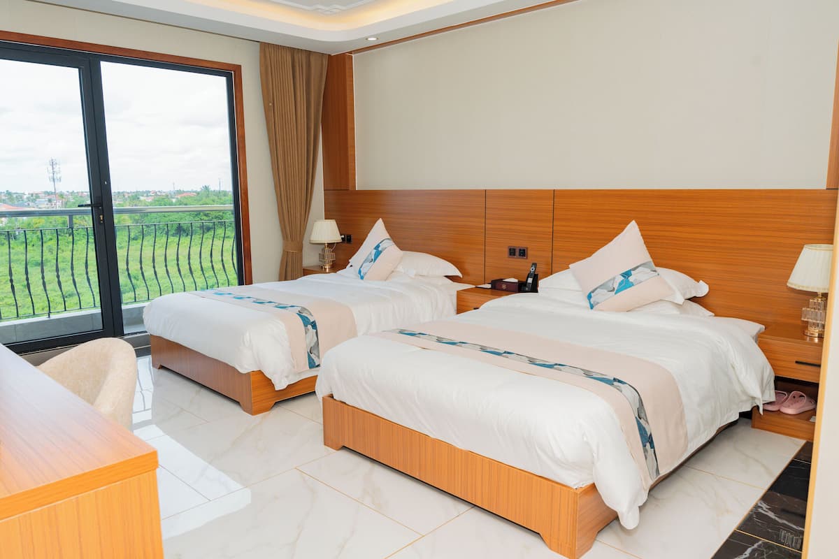 Family Suite, City View | In-room safe, blackout drapes, soundproofing, iron/ironing board
