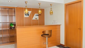 Suite familiar, vistas a la ciudad | Cocina privada