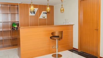 Suite familiar, vistas a la ciudad | Cocina privada