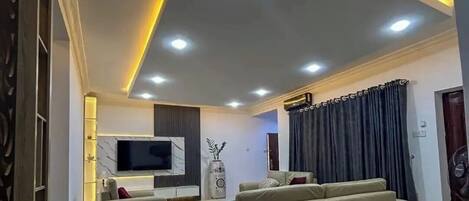 Deluxe Apartment, Balcony, City View | Living area